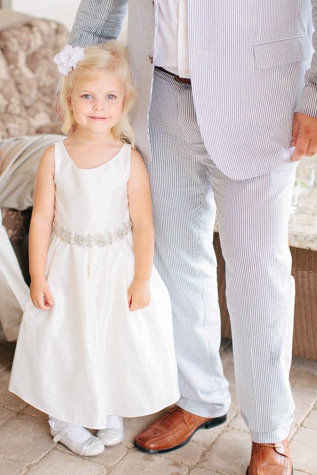 backyard wedding flower girl, seersucker suit, elkhart lake wedding photographer, victorian village wedding, backyard wisconsin wedding, wisconsin lake wedding, fine art wisconsin wedding photography, milwaukee and madison wedding photographer Carly McCray Photography 