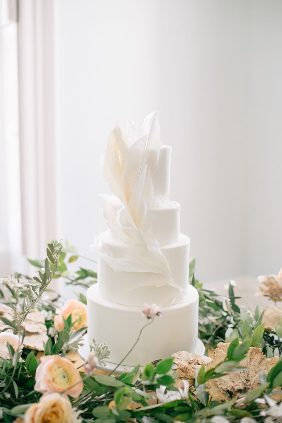 wisconsin bride magazine editorial wedding cake, carly mccray photography, lake geneva wedding photographers, private estate lake geneva wedding, modern wedding cake, lush wedding cake table florals