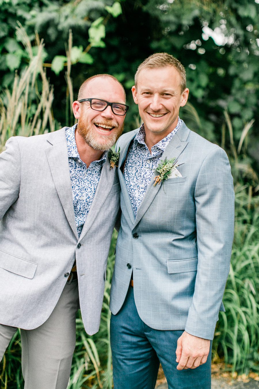 modern greenhouse wedding photos, carly mccray photography, lake geneva wedding photographer, madison wedding photographers, modern greenery wedding, modern wisconsin greenhouse wedding, modern greenery wedding, sleek wedding dress, greenery boutonnieres, black taper candles, green florals, modern greens