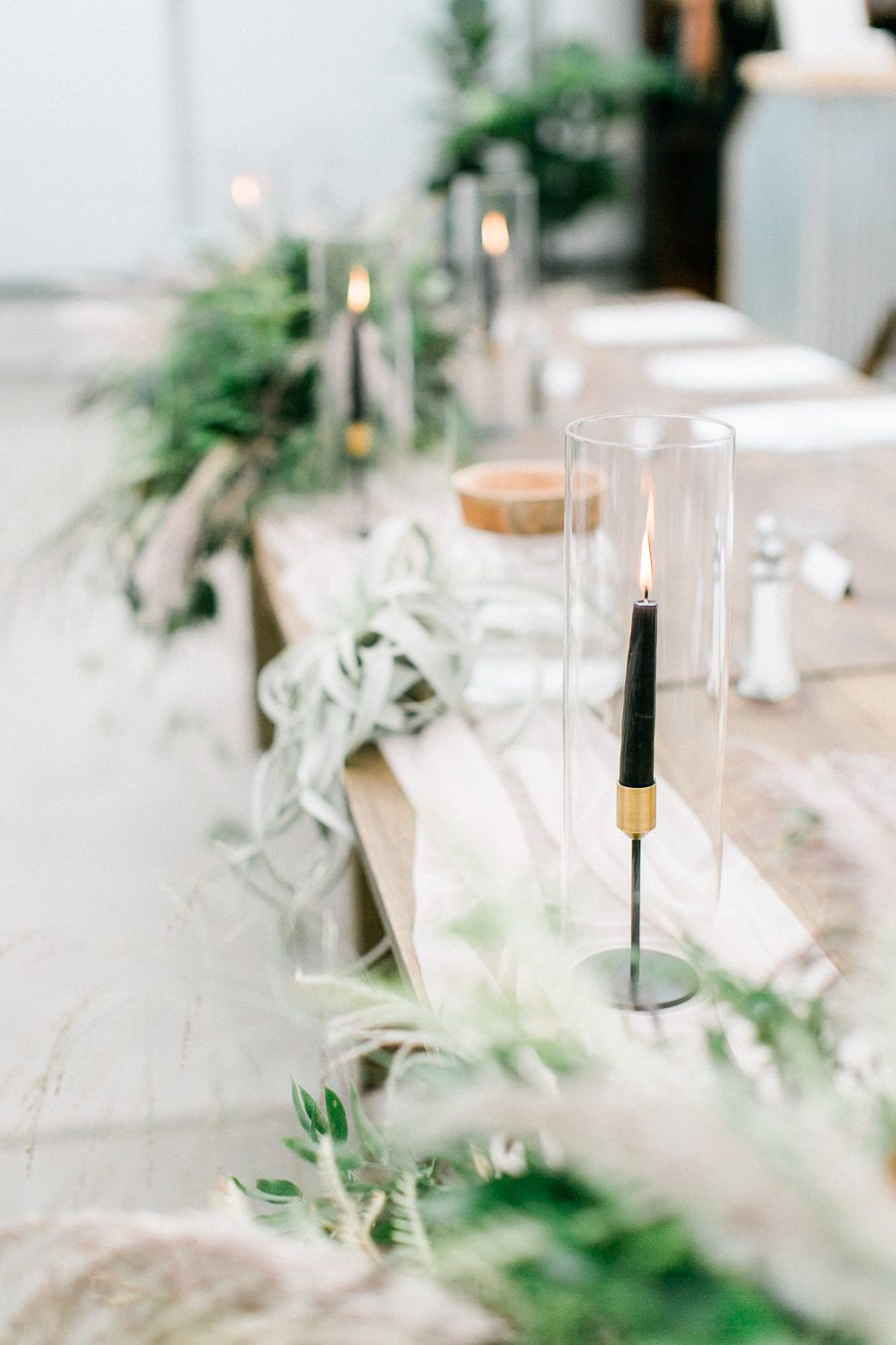 modern greenhouse wedding photos, carly mccray photography, lake geneva wedding photographer, madison wedding photographers, modern greenery wedding, modern wisconsin greenhouse wedding, modern greenery wedding, sleek wedding dress, greenery boutonnieres, black taper candles, green florals, modern greens