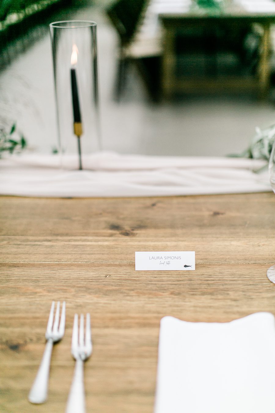 modern greenhouse wedding photos, carly mccray photography, lake geneva wedding photographer, madison wedding photographers, modern greenery wedding, modern wisconsin greenhouse wedding, modern greenery wedding, sleek wedding dress, greenery boutonnieres, black taper candles, green florals, modern greens