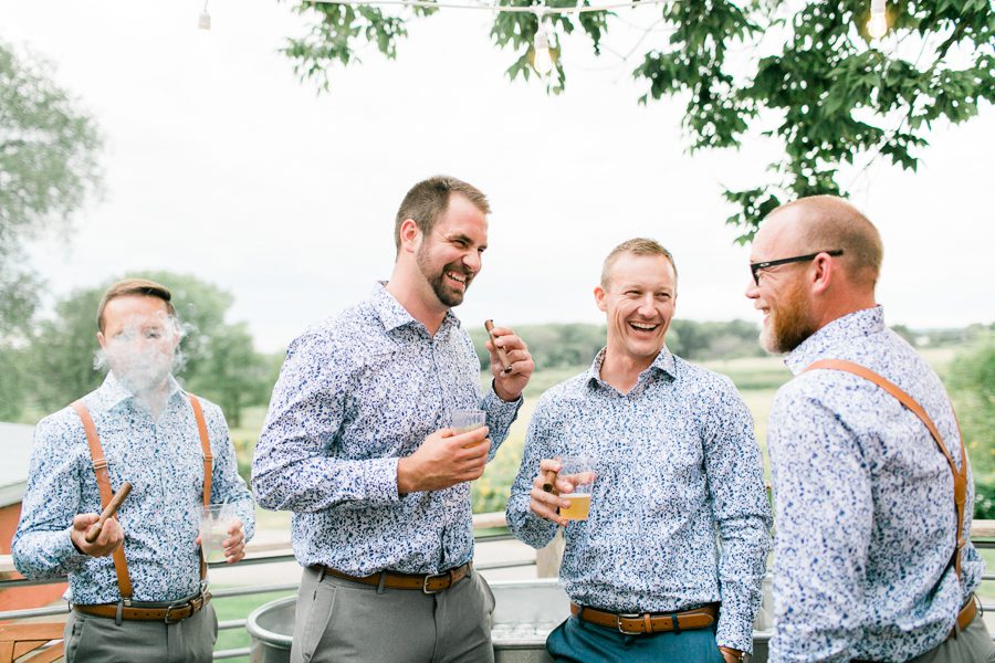 modern greenhouse wedding photos, carly mccray photography, lake geneva wedding photographer, madison wedding photographers, modern greenery wedding, modern wisconsin greenhouse wedding, modern greenery wedding, sleek wedding dress, greenery boutonnieres, black taper candles, green florals, modern greens