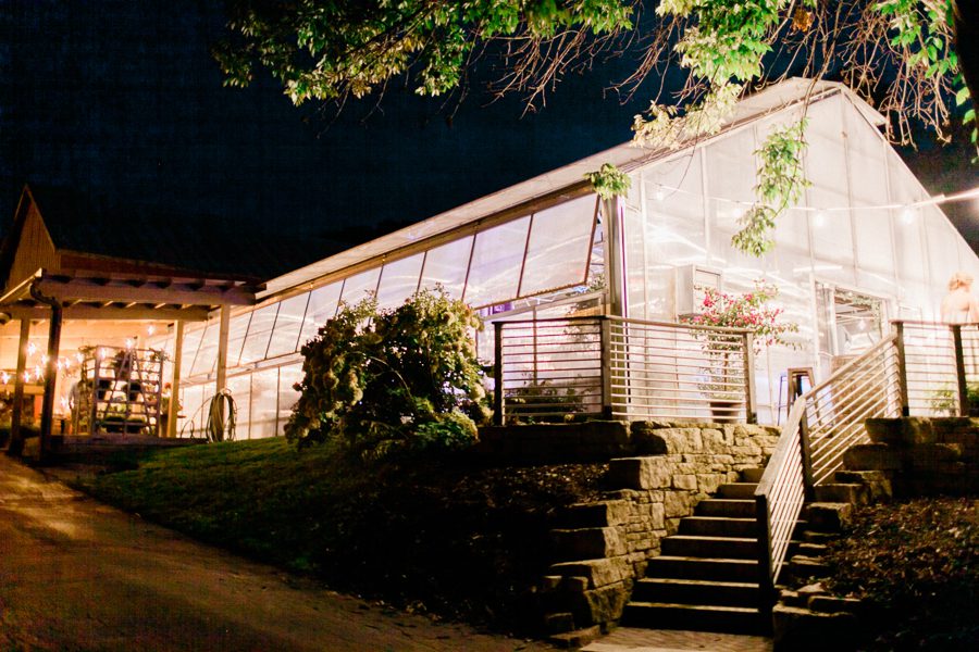 modern greenhouse wedding photos, carly mccray photography, lake geneva wedding photographer, madison wedding photographers, modern greenery wedding, modern wisconsin greenhouse wedding, modern greenery wedding, sleek wedding dress, greenery boutonnieres, black taper candles, green florals, modern greens